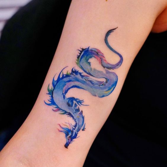 15 examples why is forearm excellent place for dragon tattoo