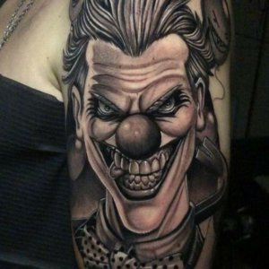 20 arm clown tattoo examples you can use as inspiration 2