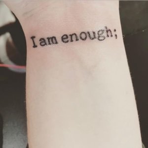 5 Extraordinary lettering tattoos of I am enough for any wrist 4