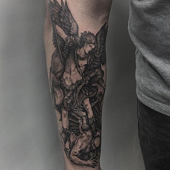 Accept miracle and discover religious tattoos with St Michael forearm  tattoos