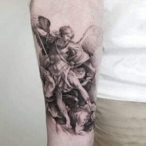 Accept miracle and discover religious tattoos with St Michael forearm tattoos 4
