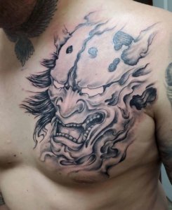 Consider these 15 mind blowing and scary Oni mask tattoos 8