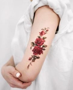 Cover your arm with a beautiful rose tattoo 4