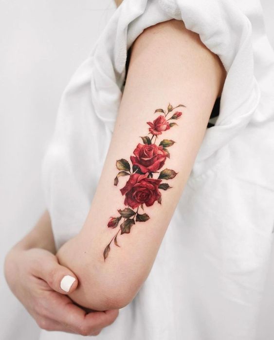 Cover your arm with a beautiful rose tattoo