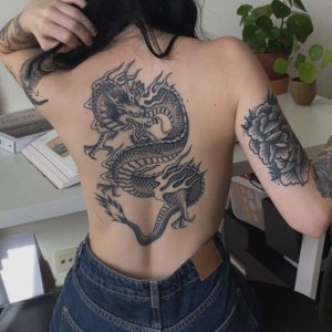 Dragon back tattoo in 15 images for men and women 12