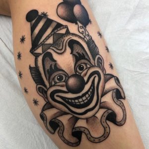 Happy clown face is gorgeous tattoo on any body part 5