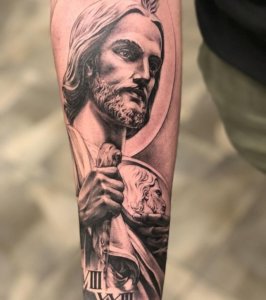 If you dont want big but inspiring tattoo of San Judas get a half sleeve tattoo of him 1