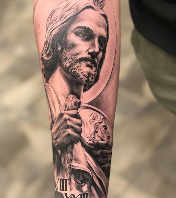 If you don’t want big but inspiring tattoo of San Judas get a half sleeve tattoo of him