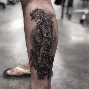 Make your leg look stronger with a samurai tattoo 5