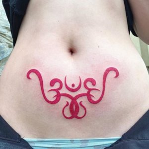 Mind blowing examples of womb tattoos for female 4
