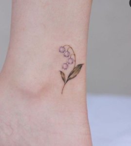 Minimalist lily of the valley tattoo which makes your femininity special 4