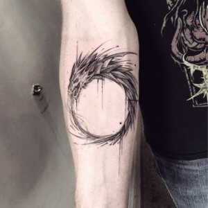 Ouroboros is symbol depicting dragon eating its own tail and very often used as motive for tattoo 5