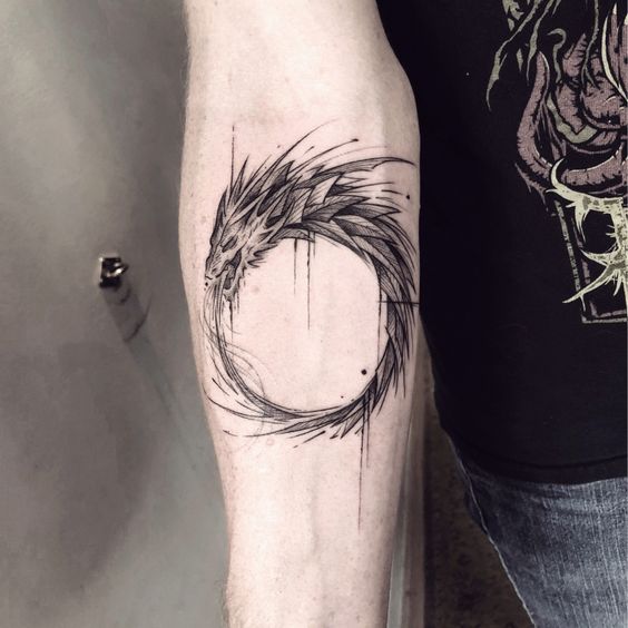 Ouroboros is symbol depicting dragon eating its own tail and very often used as motive for tattoo