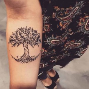 Popular tree forearm tatto ideas for women 3
