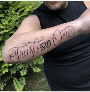 Remind yourself to important life rule with Trust no One tattoo 5