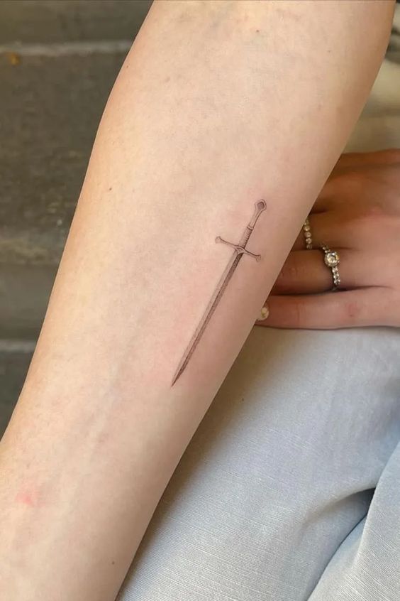 7 Celebrity Sword Tattoos  Steal Her Style