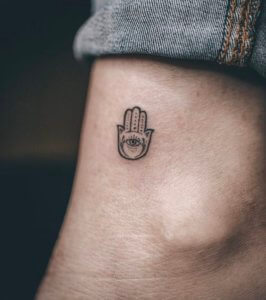 Small Hamsa tattoo is good fit for males and females 4