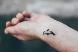 Stunning dolphin tattoos suitable for wrist 5