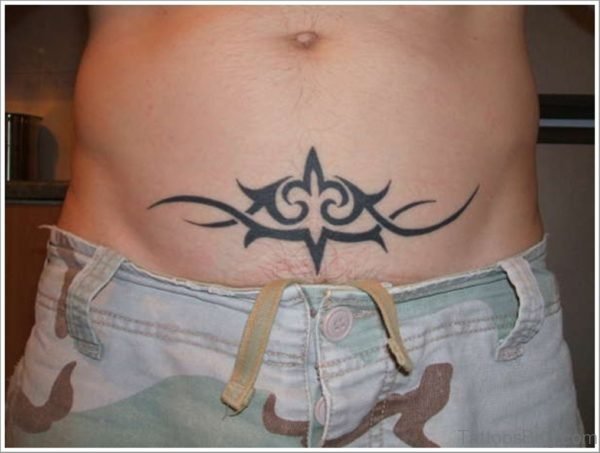 black succubus tribal tattoo in pelvic area