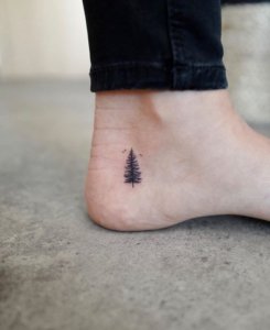 Why not check these extraordinary minimalist pine tree tattoo designs 2