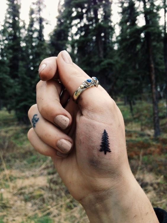 Pine tree tattoo on the wrist