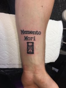 Why not get memento mori tattoo on your forearm 3