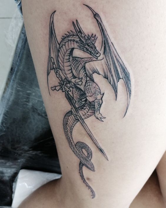 Sword and Dragon tattoo  Tattoo of a dragon around a sword  Flickr