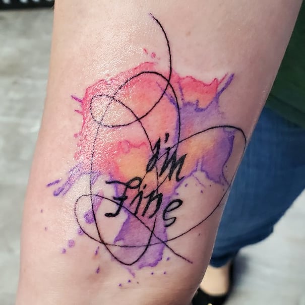 Meaning of 'I'm Fine, Save Me' Tattoo on forearm