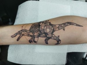 10 incredible images of geometric dinosaur tattoos for your inspiration 7