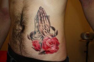 20 Mind blowing praying hands tattoos 12