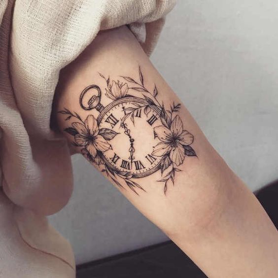 20 arm clock tattoo images you can use as inspiration