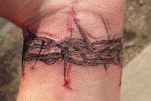Crown of thorns tattoo on wrist is really stunning Check it here 5
