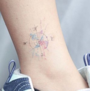 Cute and small compass tattoo for women 4