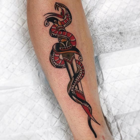 Dagger with snake is really astonishing tattoo