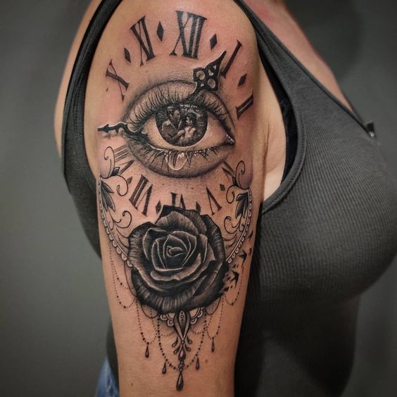 Did you know that combination of clock and rose tattoo can look so luxuriously