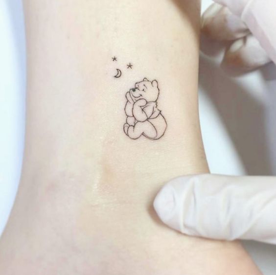 Winnie The Pooh tattoo  Simple tattoo designs Elegant tattoos Simple  flower tattoo