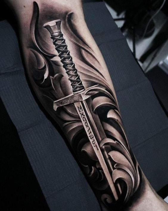 How badass sword forearm tattoo will make you look absolutely impressive