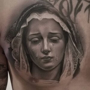 If you are religious you can get a tattoo of Virgin Mary 4