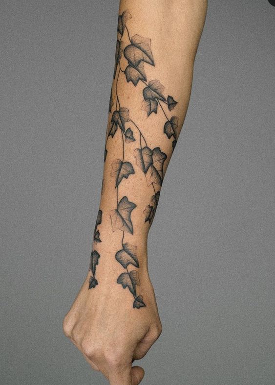 ivy leaves along arm pit tattoo
