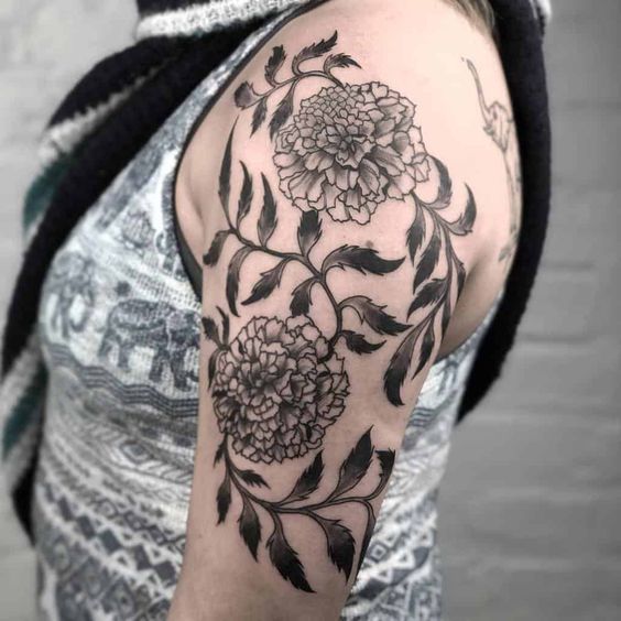 Jumpstart into black and white tattoos with Black & White Marigold Tattoo