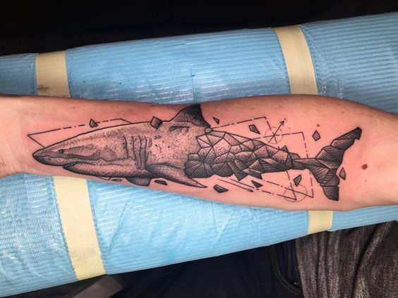 Really surprising but geometric shark tattoo can look impressive