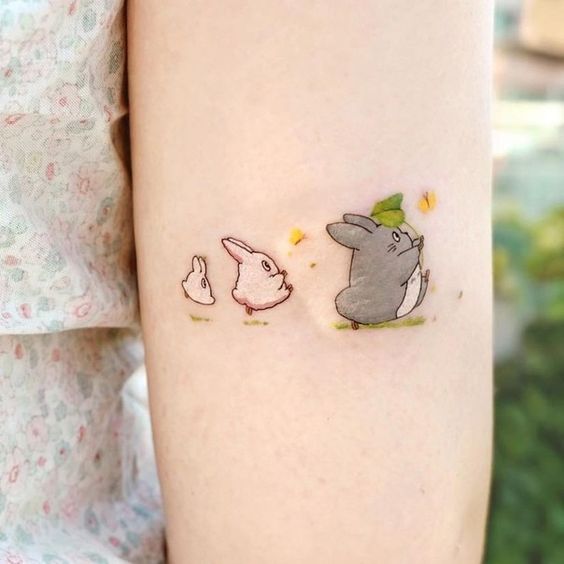 Mini Totoro tattoo tribute to Studio Ghibli Minimalistic tattoo made by  Ciotka Zu in Dziarczyncy Studio in Pozna  Tatouage ghibli Tatouage  Idées de tatouages