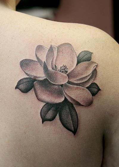 A pretty poppy and gardenia tattoo I got done by Evangeline Sellers at Once  in a Blue Moon Tattoo in Georgia  rtattoos
