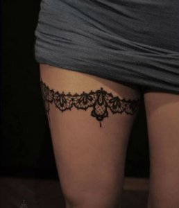 Be irresistible with lace garter thigh tattoo 2