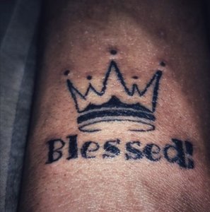 Blessed lettering tattoo with crown is popular choice these days 5