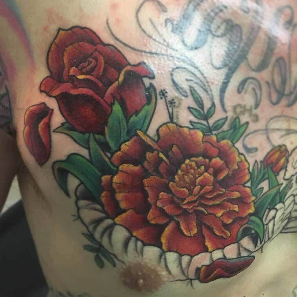 Breathtaking colourful marigolds with rose tattoo designs