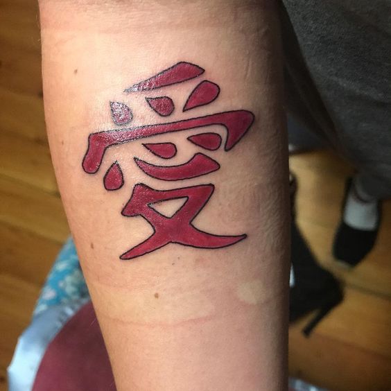 Kanji signifying love Tooth gems ( Gaara Tattoo ) © ISISNGOLD