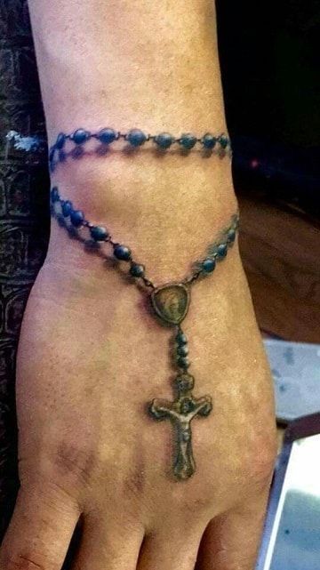 small rosary tattoo on wrist  Rosary tattoo wrist Rosary tattoo Tattoo  bracelet