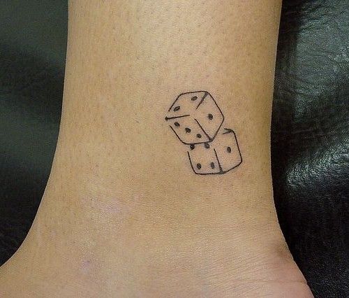 This is proof that simple dice tattoos can be extraordinary