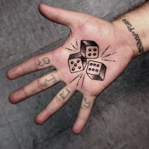 Magic of the beauty is in traditions. Check these traditional dice tattoo ideas